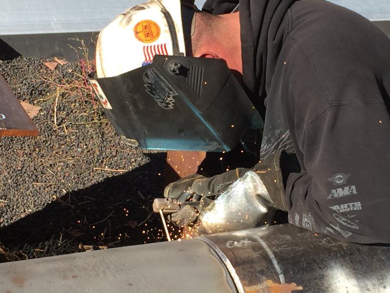 man welding