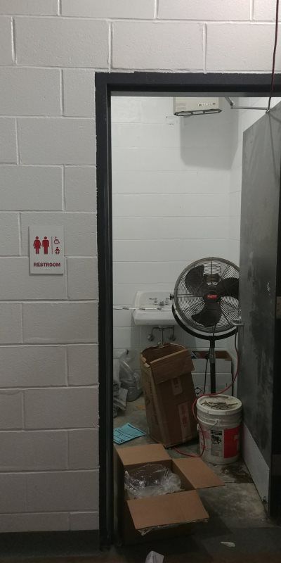 ADA washroom sign with Braille, commercial storefront awnings
A clear and modern ADA-compliant washroom sign featuring Braille and tactile characters. This sign is designed for easy identification and accessibility, making it ideal for installation n