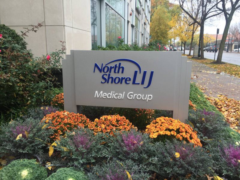 Mineola Monument Pylon Signs
A modern monument sign for North Shore LIJ Medical Group, featuring sleek metal panels, bold blue lettering, and landscaped surroundings.
The North Shore LIJ medical group monument sign is a sleek and professional signage