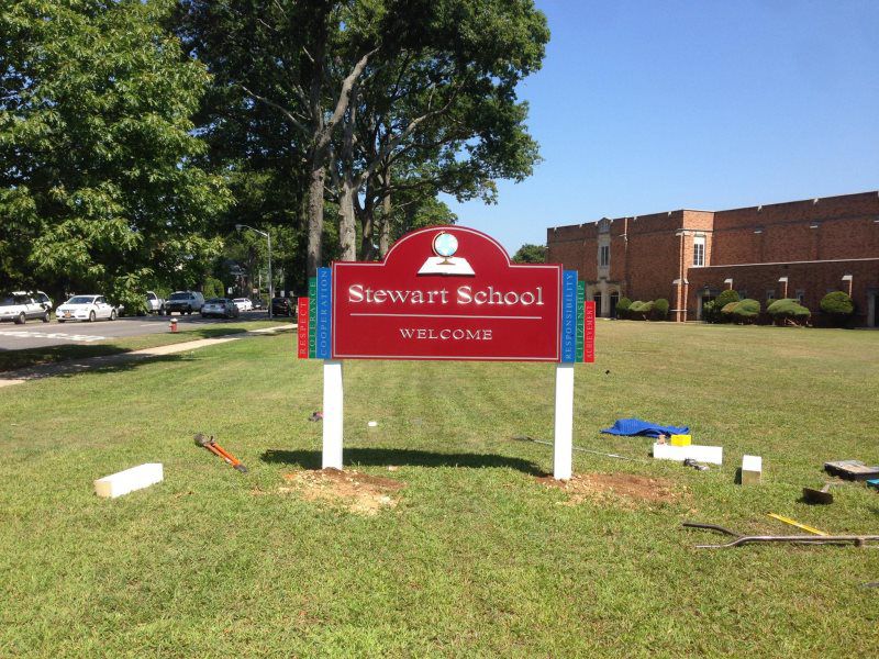 Mineola Carved Signs
A showcase of different types of carved signs, including wooden, acrylic, and metal options, displayed in a shop. Each sign is meticulously crafted by Roll Up Awnings, a leading awning business near me in Mineola, New York. From 