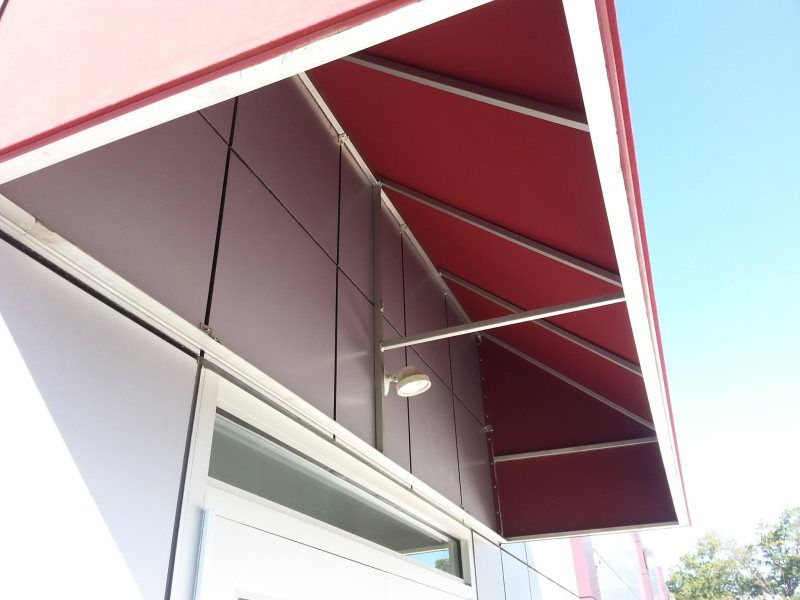 Mineola Awnings Signs
Industrial awning installation by Mineola Signs and Awnings in Mineola
A robust industrial awning from Mineola Signs and Awnings, designed to withstand tough conditions. Installed in Mineola, New York by Roll Up Awnings, it’s pe