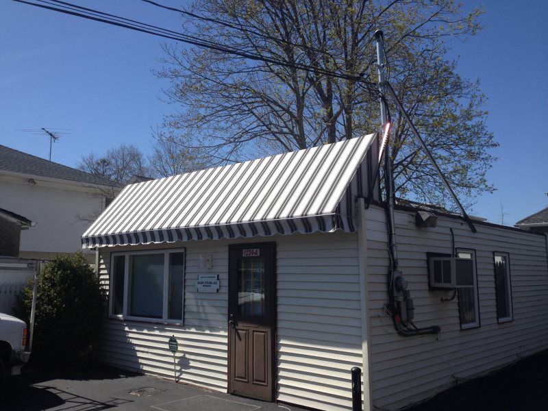 Mineola Awnings Signs
Patio awning by Mineola Signs and Awnings in Mineola, New York
A beautiful patio awning by Mineola Signs and Awnings in Mineola, New York. This awning creates a perfect outdoor space for relaxation and entertaining. Installed by