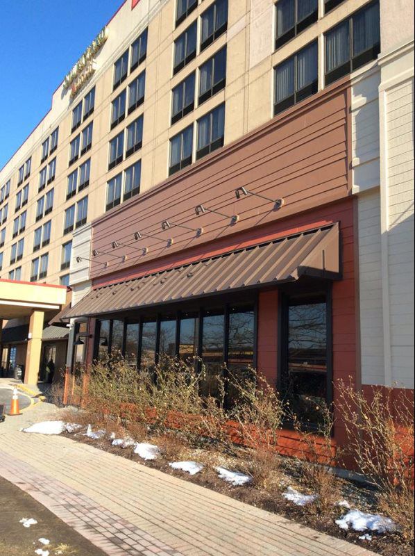 Mineola Awnings Signs
Shop front motorized entrance awning by Mineola Signs and Awnings, Mineola, New York
A sleek shop front motorized entrance awning by Mineola Signs and Awnings in Mineola, New York. This awning provides automated convenience and 