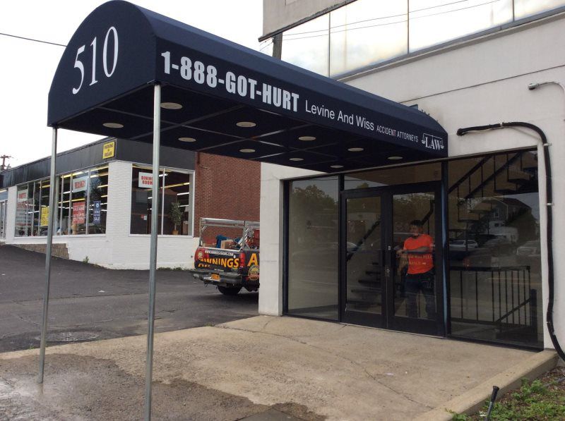 Mineola Awnings Signs
Business entrance awning by Mineola Signs and Awnings, Mineola, New York
A professional business entrance awning by Mineola Signs and Awnings in Mineola, New York. This awning adds a sophisticated touch to your business entrance