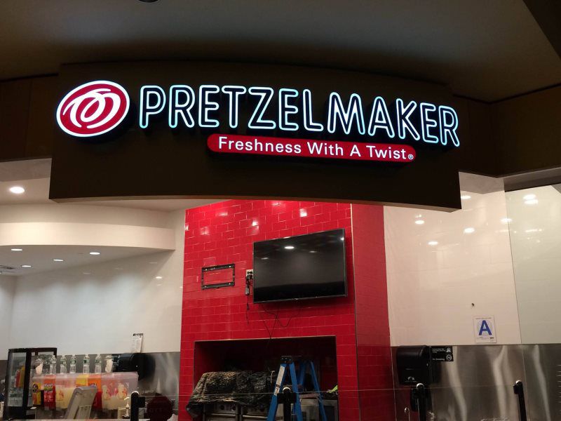 Channel Letters
A bold open face channel letter sign with bright neon lights, designed to attract attention in busy commercial districts in Mineola, New York. Created by Roll Up Awnings, this sign pairs well with outdoor shop awnings, garden awnings 