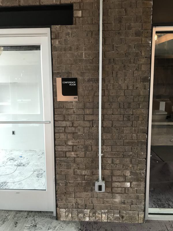 Mineola ADA Signs ADA room number sign, commercial storefront awnings
A sleek ADA room number sign with tactile Braille characters, perfect for buildings with commercial storefront awnings. The sign ensures compliance and easy room identification.