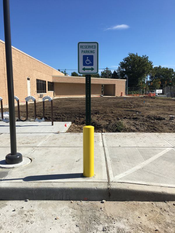 This image highlights a set of street signs that are commonly found in urban environments, including directional signs, traffic light signs, and no parking signs. Our street signs are meticulously designed to offer clear instructions to drivers and p