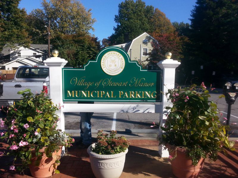 Mineola Carved Signs
A classic storefront carved sign with intricate details, perfect for attracting customers to a boutique or café in Mineola, New York. Made by Mineola Signs and Awnings, this sign is designed to last and pairs beautifully with our
