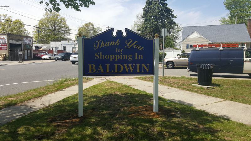 Mineola Carved Signs
A timeless storefront carved sign with elegant script, perfect for adding charm to any business in Mineola, New York. Available at Roll Up Awnings, this sign is designed to complement our residential canopy awnings, commercial en